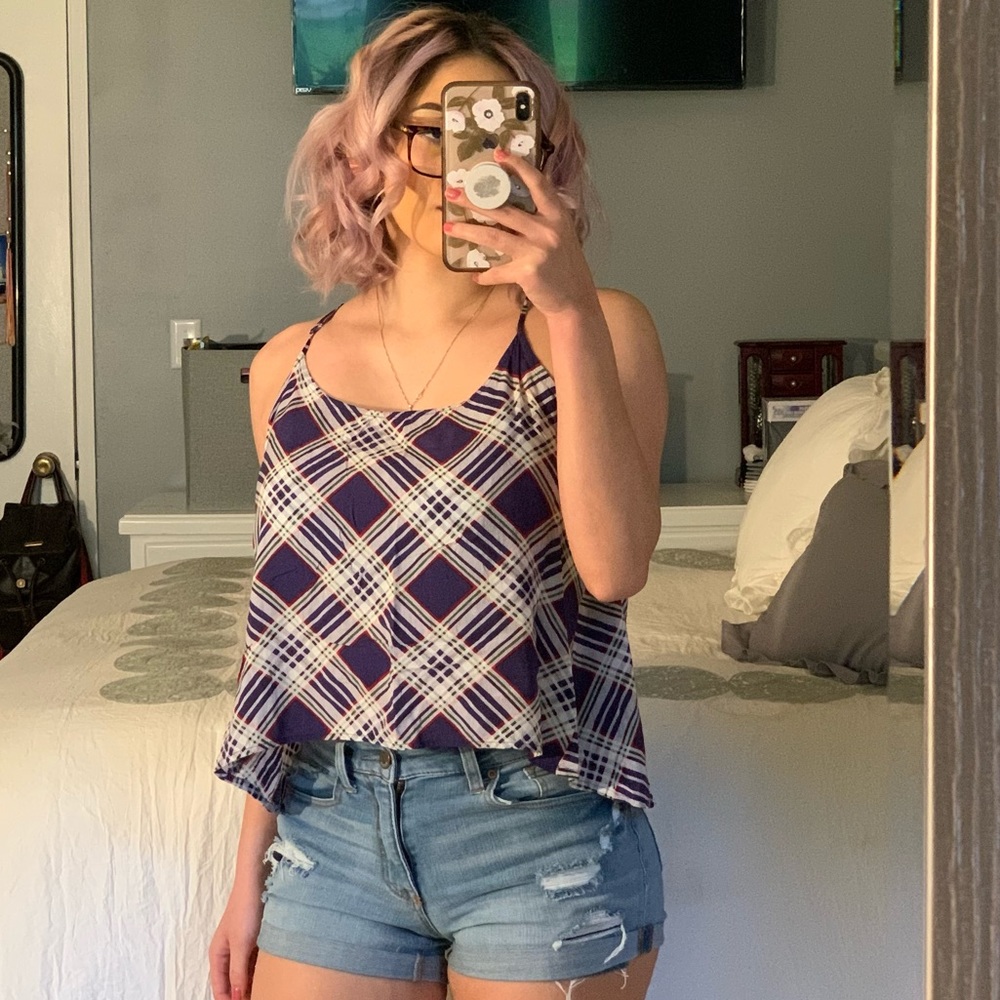 Woman’s blue blouse wet seal plaid